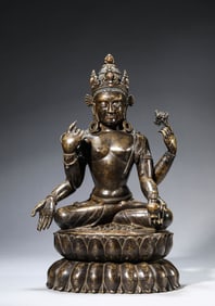 A TIBETAN PALA STYLE ALLOY COPPER AND SILVER-INLAID FOUR-ARMED AVALOKITESHVARA