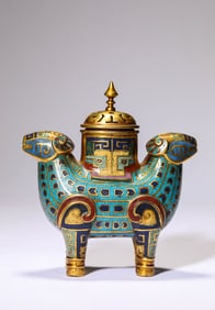 A CLOISONNé ENAMEL DOUBLE GOATS