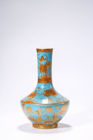 A BLUE-GROUND CORAL-RED AND GILT-DECORATED 'FLOWERS' MOONFLASK