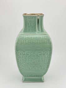 A CELADON 'ANTIQUITIES' SQUARE VASE
