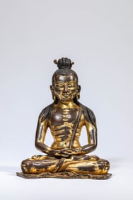 A GILT-BRONZE BUDDHA FIGURE
