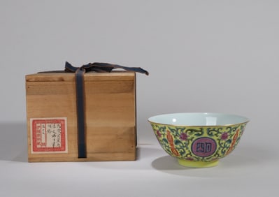 A YELLOW-GROUND FAMILLE ROSE 'PASSION FLOWER' BOWL