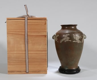 A COPPER 'FLYING CRANES'  VASE