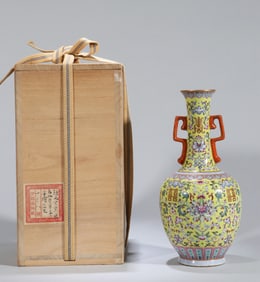 A YELLOW-GROUND FAMILLE ROSE 'FLORAL AND XI'  VASE