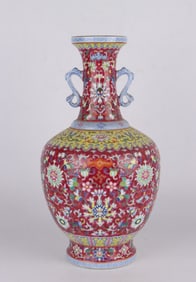 A RUBY-RED GROUND FAMILLE ROSE 'INTERLOCKING FLOWERS'  VASE