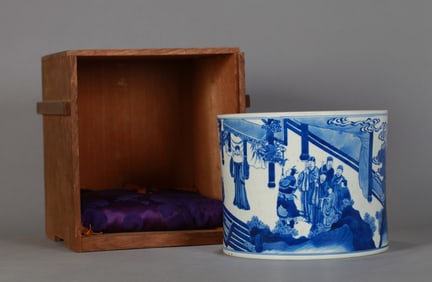 A BLUE AND WHITE BRUSH POT