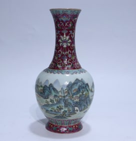 A RED-GROUND FAMILLE ROSE MEDALLION 'LANDSCAPE' VASE