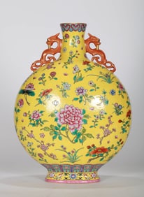 A YELLOW-GROUND FAMILLE ROSE 'FLORAL' MOONFLASK