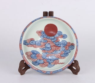 A BLUE AND WHITE WITH UNDERGLAZED RED 'SUN AND CLOUDS' WASHER