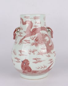 A UNDERGLAZED RED 'DRAGONS' VASE