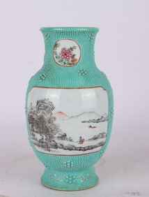 A TURQUOISE-GREEN GROUND FAMILLE ROSE MEDALLION WITH GRISAILLE 'LANDSCAPE' VASE