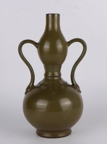 A TEA-DUST GLAZED GOURD-SHAPED VASE