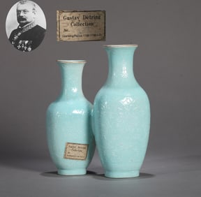 A TURQUOISE-GREEN GROUND WITH WHITE VASE