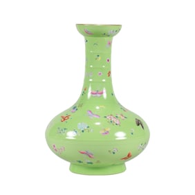 A GREEN-GROUND FAMILLE ROSE 'FLOWERS AND BUTTERFLIES'  VASE