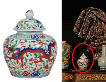 A WUCAI 'TWO DRAGONS CHASING PEARL' COVERED JAR