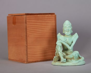 A TURQUOISE-GREEN GLAZED 'EMACIATED ARHAT' STATUE