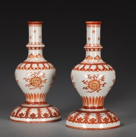 A PAIR OF IRON-RED VASES