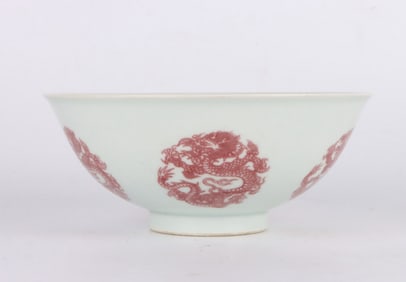 A UNDERGLAZED RED 'DRAGONS' BOWL