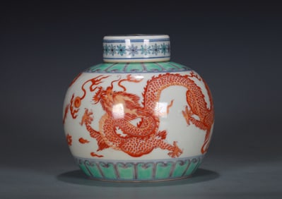 AN IRON-RED 'DRAGON' COVERED JAR