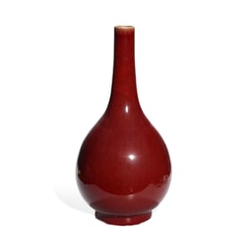 A RED-GLAZED VASE