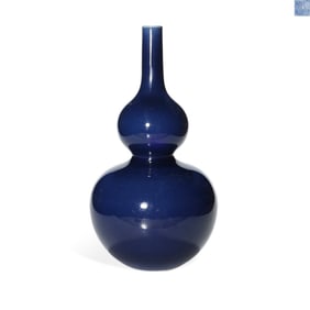 A BLUE GLAZED GOURD-SHAPED VASE