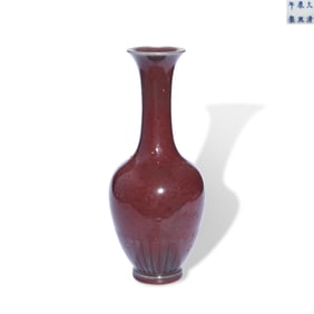 A RED-GLAZED CHRYSANTHEMUM SHAPED VASE