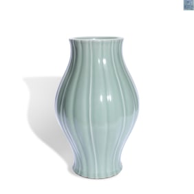 A CELADON OLIVE-SHAPED VASE
