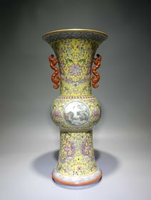 A YELLOW-GROUND FAMILLE ROSE WITH MEDALLION 'LANDSCAPES' TWO-HANDLED
