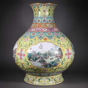 A YELLOW-GROUND FAMILLE ROSE MEDALLION 'EIGHT TRIGRAMS, INTERLOCKING FLOWERS AND LANDSCAPE'