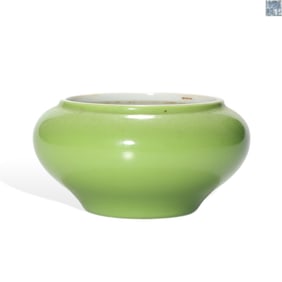 A GREEN GLAZED WATER POT