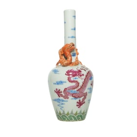 A FAMILLE ROSE MOLDED 'DRAGON' VASE