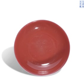 A RED-GLAZED DISH