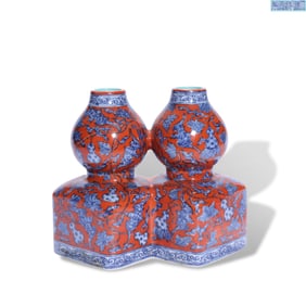 A CORAL-RED GROUND BLUE AND WHITE 'BAT AND DEER' DOUBLE-GOURD VASE