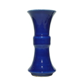 A BLUE GLAZED BEAKER