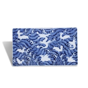 A BLUE AND WHITE 'SEA MONSTERS' TILE