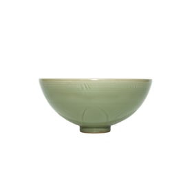 A LONGQUAN CELADON CARVED 'FLORAL' BOWL