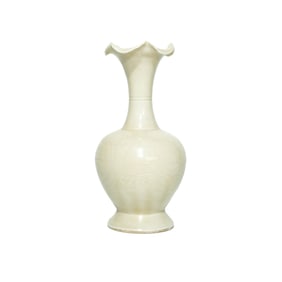 A DING TYPE WHITE-GLAZED CARVED 'FLORAL' VASE