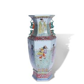 A FAMILLE ROSE 'EIGHT IMMORTALS' TWO-HANDLED VASE