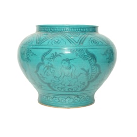 A -GREEN GLAZED 'FIGURES AND CRANES' JAR