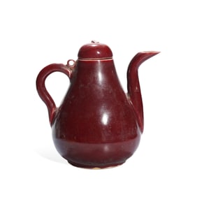 A RED-GLAZED PEAR-SHAPED TEAPOT