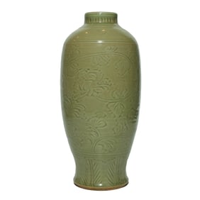 A YAOZHOU CARVED 'FLORAL' VASE