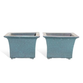 A PAIR OF FLAMBE-GLAZED FLOWER POTS