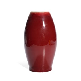 A RED-GLAZED OLIVE-SHAPED VASE