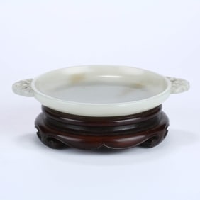A HOTAN JADE BAT-HANDLED WASHER