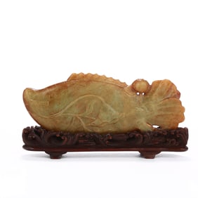 A YELLOW HOTAN JADE 'FISH' FIGURE