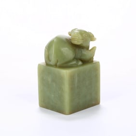 A YELLOW HOTAN JADE OX-SHAPED SEAL
