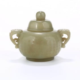 A HOTAN JADE 'POETRY' TWO-HANDLED COVERED CENSER