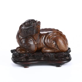 A HOTAN JADE 'LION' FIGURE