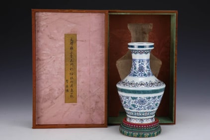 A BLUE AND WHITE WITH DOUCAI 'INTERLOCKING LOTUS' VASE