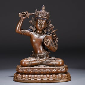 A BRONZE 'MANJUSRI BODHISATTVA' FIGURE